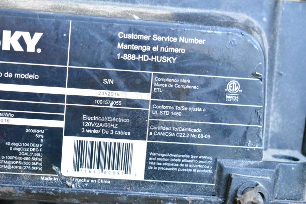 2016 Husky 0100211A Air Compressor label, featuring compliance marks, serial number 2452016, and electrical specs.