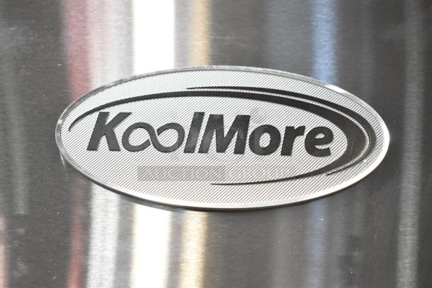 KoolMore logo on stainless steel surface of 2025 model RIR-3D-SS scratch and dent commercial refrigerator.
