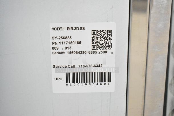 Label on KoolMore RIR-3D-SS refrigerator showing model, serial number, and service contact info.