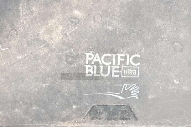 Georgia Pacific Wall Mount Paper Towel Dispenser, features "Pacific Blue Ultra" logo, used condition, durable design.