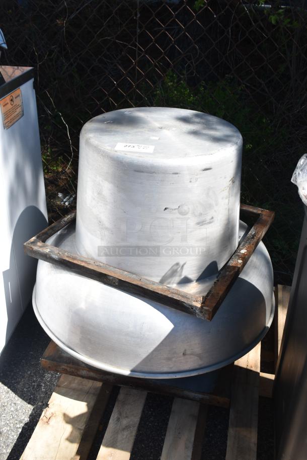 Rooftop mushroom exhaust fan in metal, sturdy condition, marked with auction tag, placed on wooden pallet.