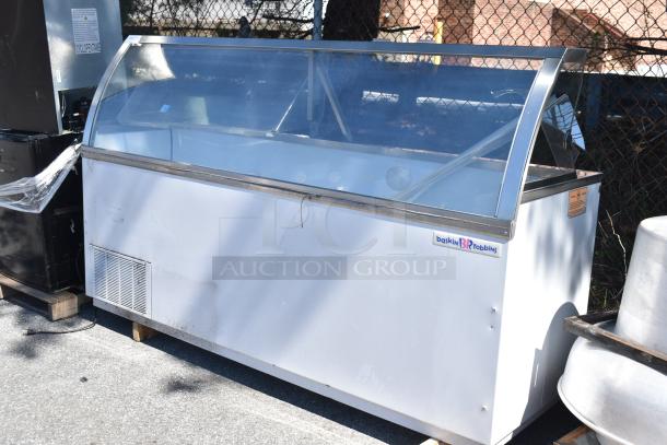 Commercial ice cream dipping cabinet, floor style, 115 volts, 1 phase. Features a glass display and Baskin-Robbins branding.