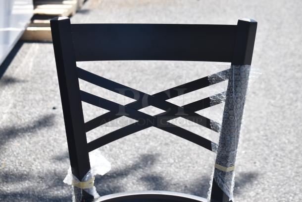 Cross back chair frame, model 164BCROSSFRN, new condition, slight imperfections; black finish with protective wrap.