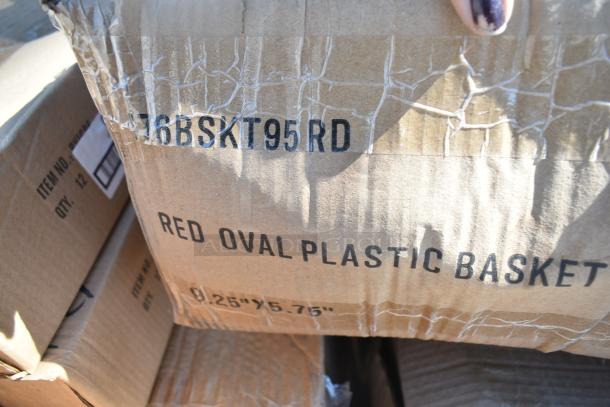Cardboard box labeled "Red Oval Plastic Basket 9.25”x5.75”" in scratched condition, indicating contents for auction.