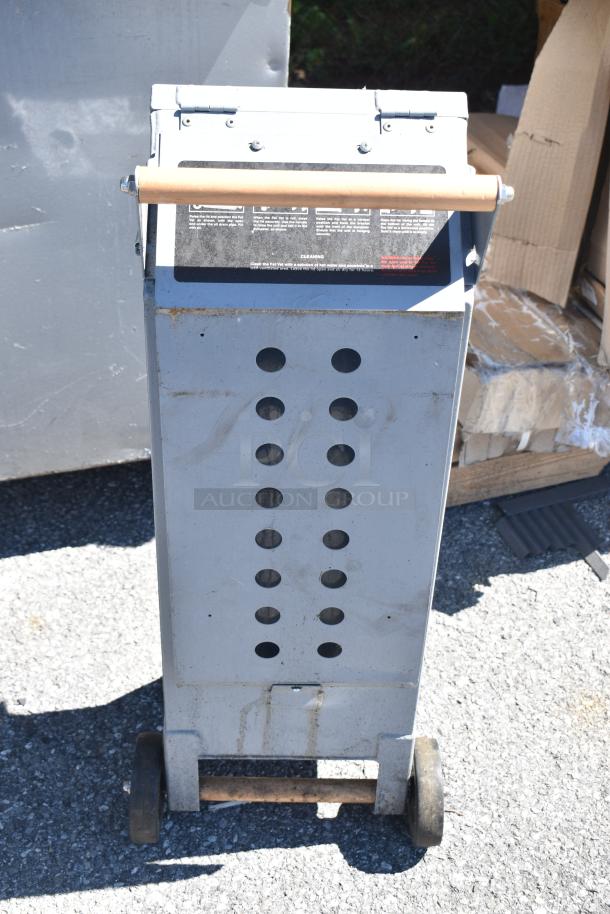 Pitco® D9109105 FAT VAT 40 lb. waste oil transport container on wheels, steel frame, handle, slight scratches visible.