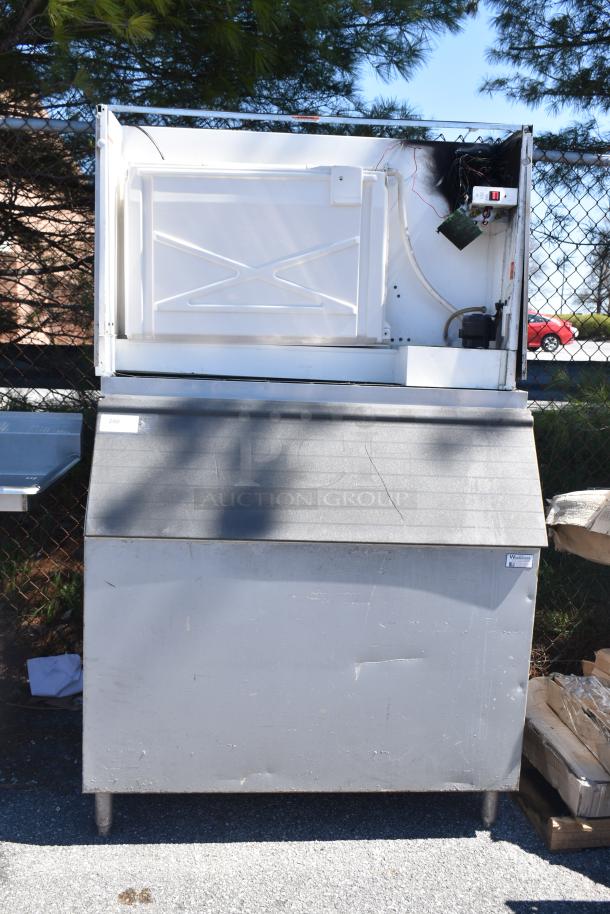 Manitowoc QY1305W commercial ice head on ice bin, 208-230V, 1 phase. Visible scratches; label indicates "280".