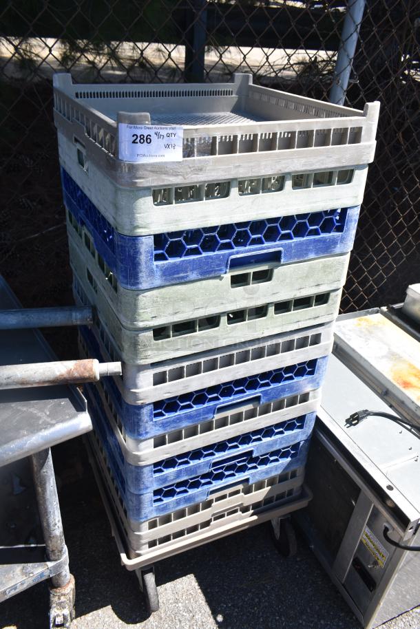 Lot of 12 poly dish caddies stacked on a dish caddy dolly with commercial casters, featuring a visible ID tag marked "286" indicating item details.