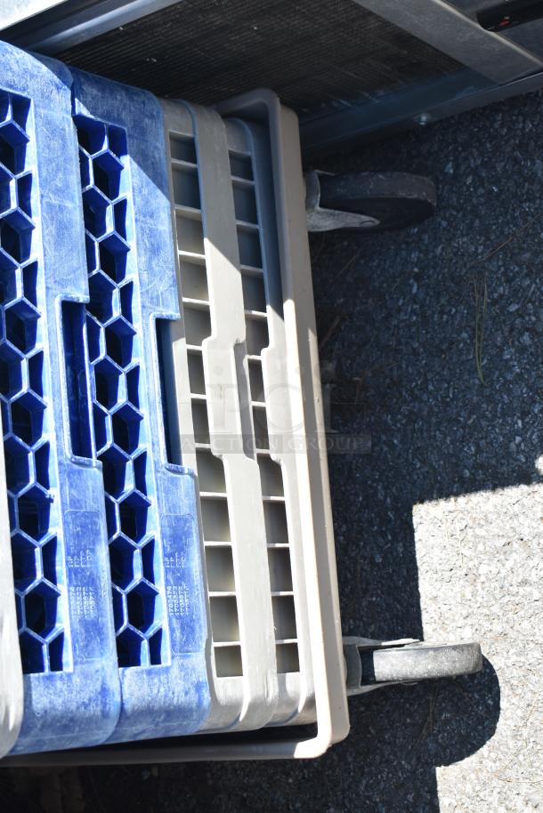 Lot of dish caddy dolly with 12 poly dish caddies on commercial casters, showing blue and gray caddies, used condition.