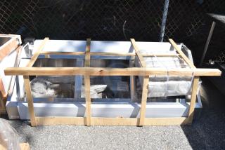 Brand new Vevor commercial hood, scratch and dent condition, in wooden crate with packaging materials visible.