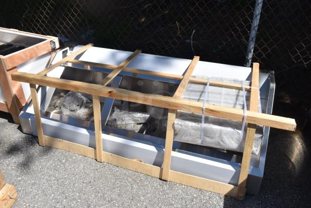 Brand new Vevor commercial hood, scratch and dent condition, in wooden shipping crate; visible packaging materials.