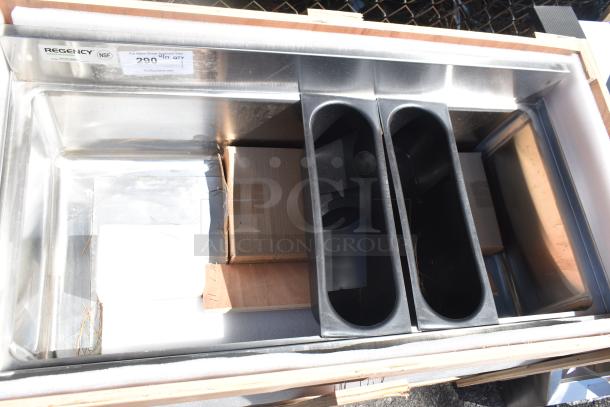 Brand new Regency 600IB1836CP 18"x36" underbar ice bin with 7 circuit post-mix cold plate, bottle holders. Scratch and dent condition.