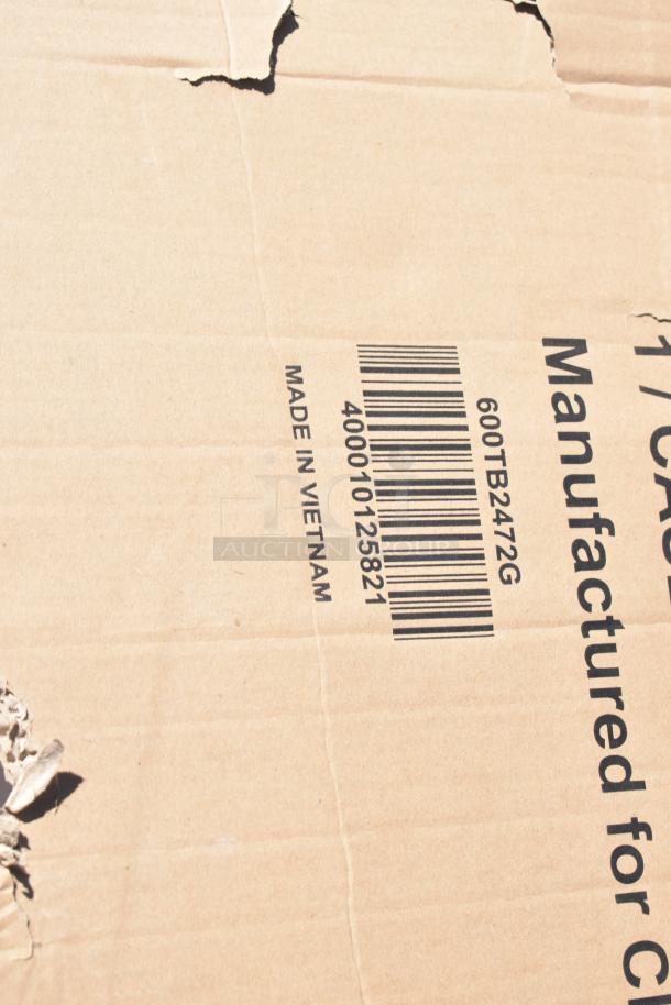 Cardboard box with barcode and "Made in Vietnam" label, showing slight tear, part of auction lot with scratch and dent items.