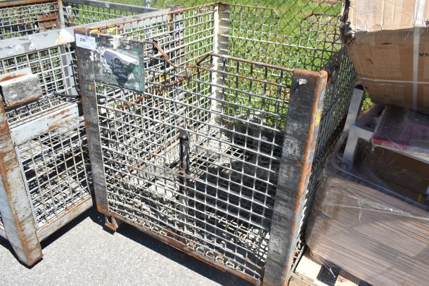 Rusty metal wire cage with grid design, weathered condition. Number label "296" visible. Suitable for storage or transport.
