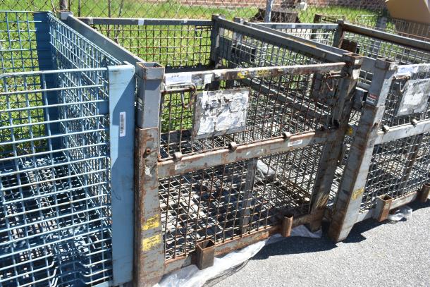 Rustic metal wire cage with grid pattern, industrial use. Visible rust and wear. Tags and labels indicate usage instructions.