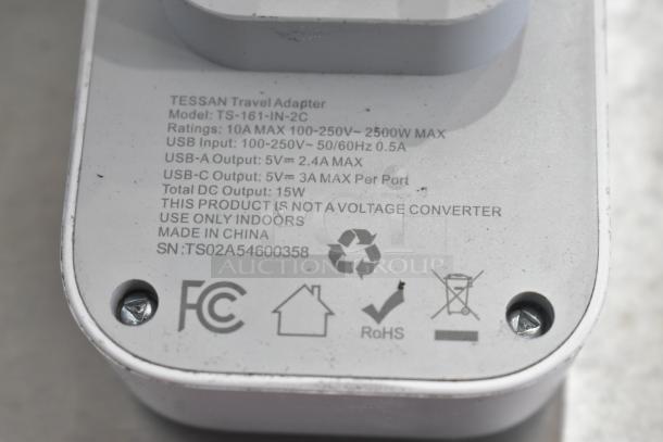 BRAND NEW SCRATCH AND DENT! TESSAN Travel Adapter, Model TS-161-IN-2C, 2500W Max, made in China, labeled for indoor use.
