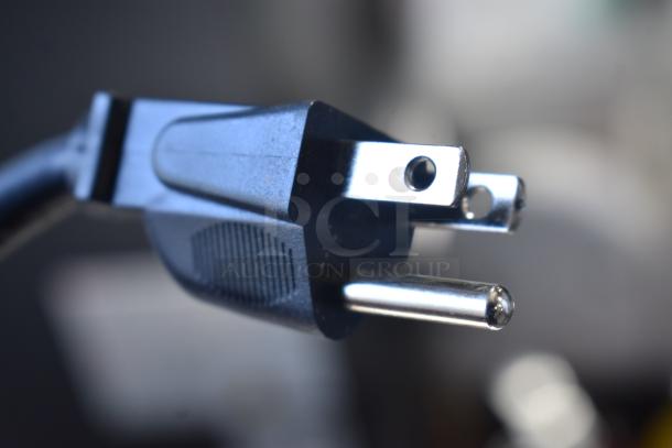 Close-up of power cord plug for Avantco 177CO16 convection oven, brand new, 120 volts, 1 phase.