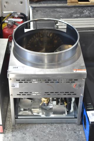 "Brand new Cooking Performance Group 351WOKR16N natural gas wok range with 16-inch ring, 125,000 BTU, selectable temperature control, and minor scratches."