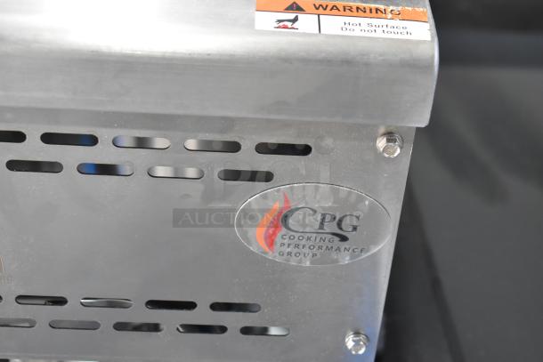 BRAND NEW Cooking Performance Group natural gas wok range, 16" ring, 125,000 BTU, scratch and dent condition, with warning label.