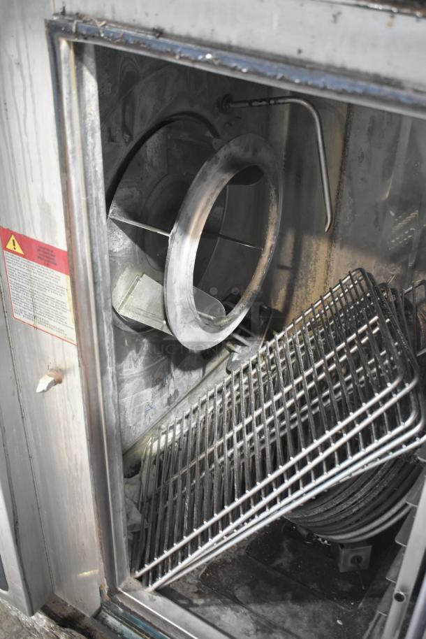 Alto Shaam CTP10-10E combi convection oven, stainless interior, racks visible, used condition, 208-240V, 3 phase.