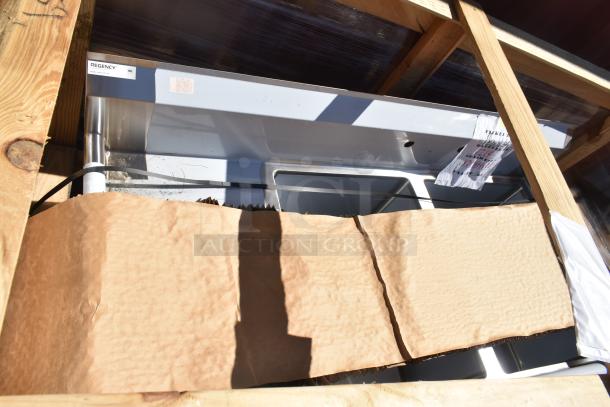 Brand new Regency 600S2182418L stainless steel 2-bay sink with left drain board, scratch and dent condition in crate.