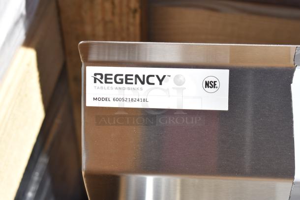 Regency 600S2182418L stainless steel 2 bay sink with left drain board. NSF certified, brand new with scratch and dent condition.