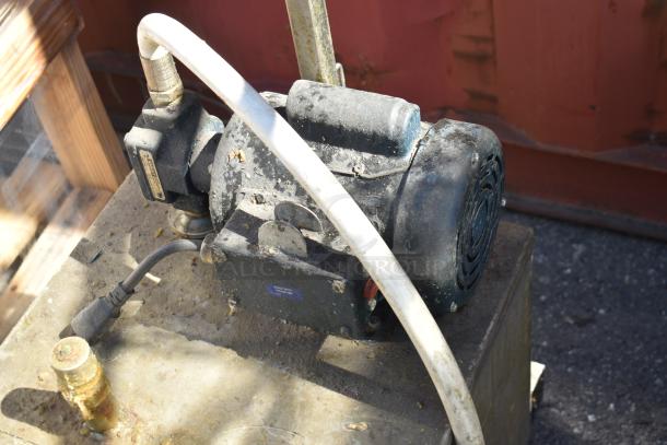 402 Commercial Oil Caddy, model 402, on casters, showing wear. Equipped with 120V, 1 phase motor and attached hoses.