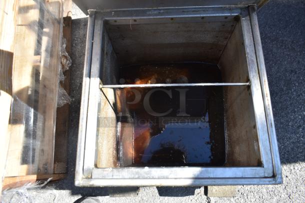 Commercial Oil Caddy Model 402 with casters. Features a robust metal container. Compatible with 120V, 1 Phase power.