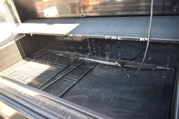 Hussmann commercial grab n go merchandiser, horizontal design, 115/208-230 volts, 1 phase, black shelves, open layout.