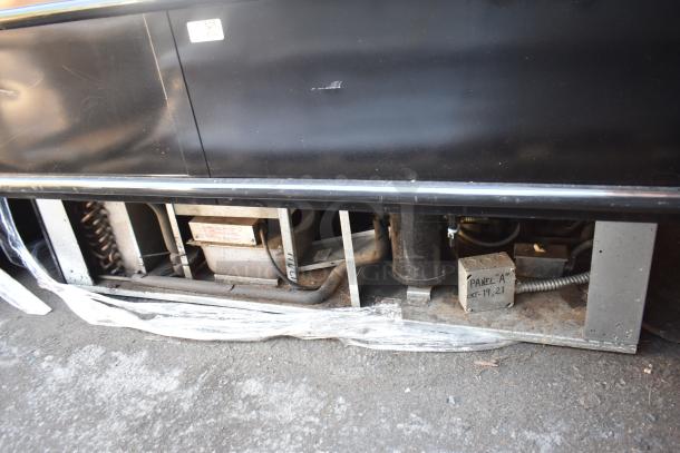 Commercial Island Style Grab N Go Merchandiser, showing mechanical components and a label marked "Panel A CKT-19, 21".