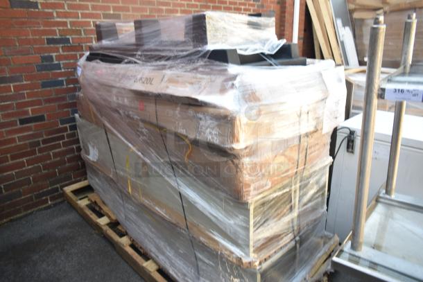 Pallet of 10 brand new scratch and dent items, including a dunnage rack and equipment stand, wrapped and stacked outdoors.