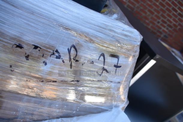 Wrapped pallet labeled "MAR-27" containing 10 new scratch and dent items, including a dunnage rack and equipment stand.