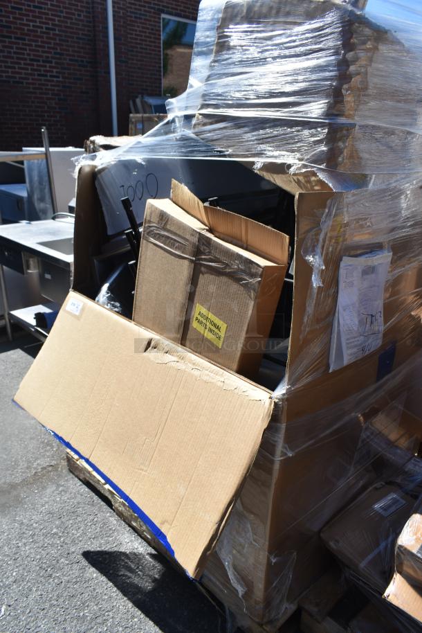 Paletted boxes labeled "Additional Parts Inside" and "Scratch and Dent" items, wrapped in clear plastic. Cardboard visibly dented.