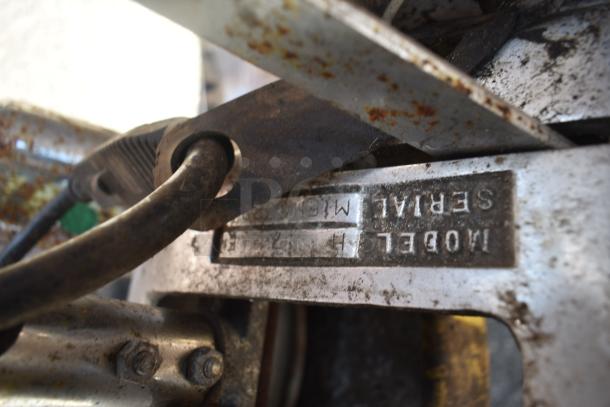 Hercules 175 RPM floor cleaner, 120 volts, 1 phase. Image shows model and serial number plate detail. Rust present.