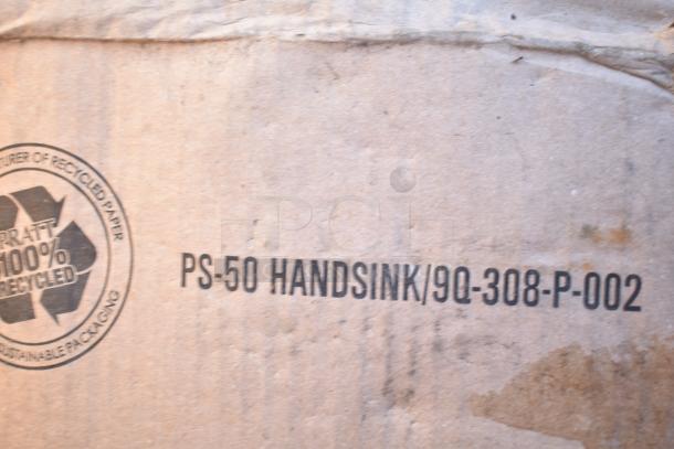 Cardboard box labeled "PS-50 HANDSINK/90-308-P-002," indicates a handsink. Box shows recycling emblem.