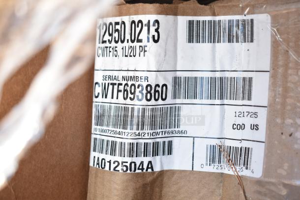 Sticker on cardboard shows product label with serial number CWTF693860, barcodes, and COO US marking.