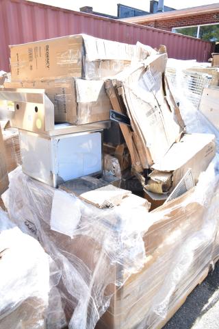 12 brand new scratch and dent items, including filler table, drain strainer basket, sink. Regency boxes visible.