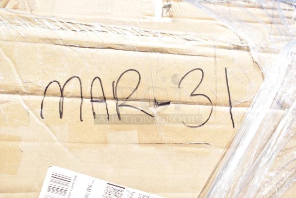 Cardboard box labeled "MAR-31" containing 12 new scratch and dent items, including pan rack, platform truck, rack cart.