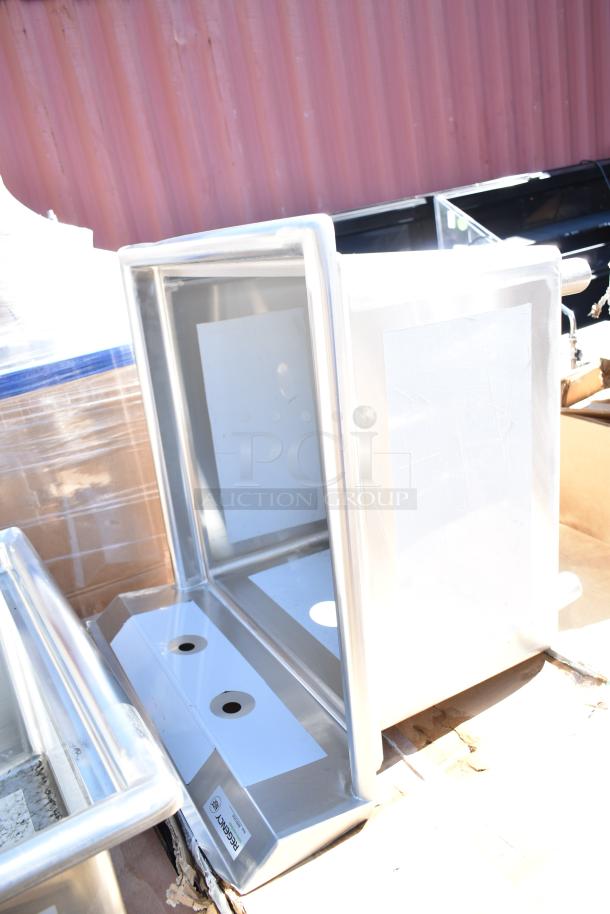 Brand new stainless steel ice bin with minor scratches and dents. Regency label visible. Part of 45-item auction lot MAR-37.