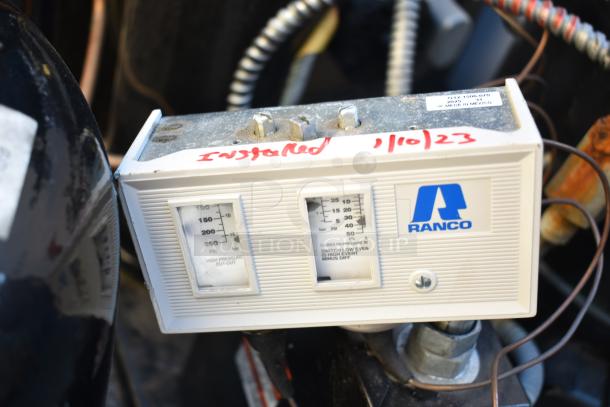 2 Tecumseh compressors, 208-230V, 1 phase. Condition appears functional. Visible control box with Ranco branding and date marking.