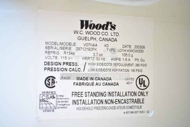 White label on Wood's V07NAA Single Door Reach In Freezer, 115V, 1 Phase. Model, serial number, and specs visible. Made in Canada.