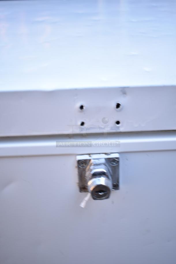 FFCWN9KRW Chest Freezer, 115 Volts, 1 Phase, visible lock mechanism, slight wear, model FFCW9NKRW.