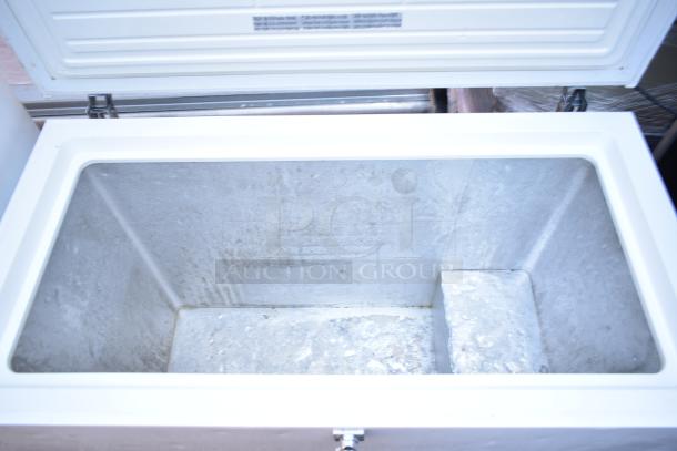 FFCW9NKRW Chest Freezer, model FFCW9NKRW. White interior, open lid, 115 Volts, 1 Phase, in used condition.