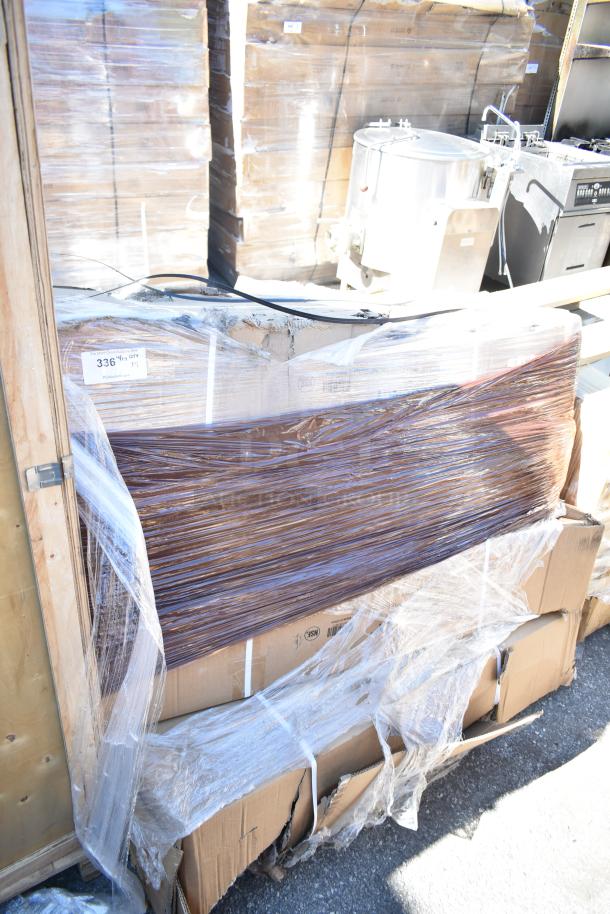 4 brand new Regency 460EB2448SLT 24" x 48" black epoxy slanted wire shelves, sealed in packaging. Scratch and dent condition.