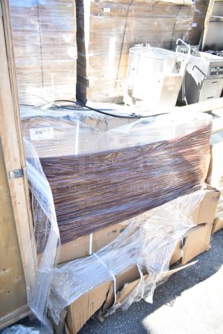 4 brand new Regency 460EB2448SLT 24" x 48" black epoxy slanted wire shelves, sealed in packaging. Scratch and dent condition.