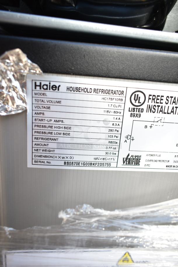 Label on Haier HC17SF10RB mini cooler, 1.7 Cu.Ft, 115V, black finish, UL listed, measures 19x18x17 inches, weighs 30 lbs.