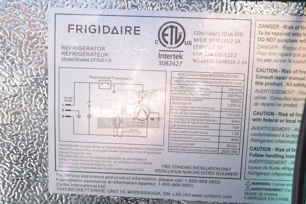 Frigidaire EFR451-D mini cooler label showing model, specs, and safety warnings, 115 volts, 2021 manufacture.