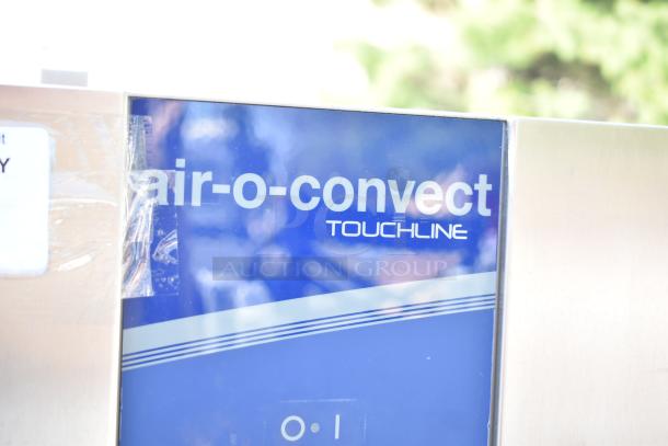 Electrolux Air-o-convect Touchline commercial oven, model 9F92225200, stainless stand with commercial casters.