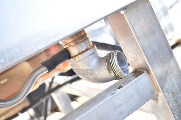 Electrolux Air-o-convect oven stand detail, showing robust metal frame and plumbing connection; model 9F92225200.