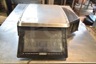 2017 Hobart HTi-7LH26 commercial scale, stainless steel, touchscreen, does not power on, model label visible.