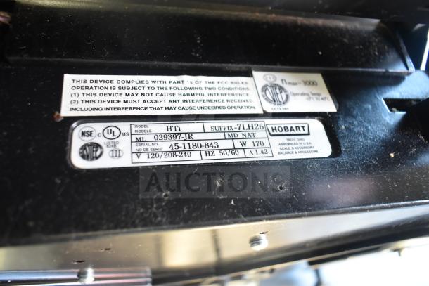 2017 Hobart HTi-7LH26 scale label showing model, serial number, and voltage details. Tested but not powering on.